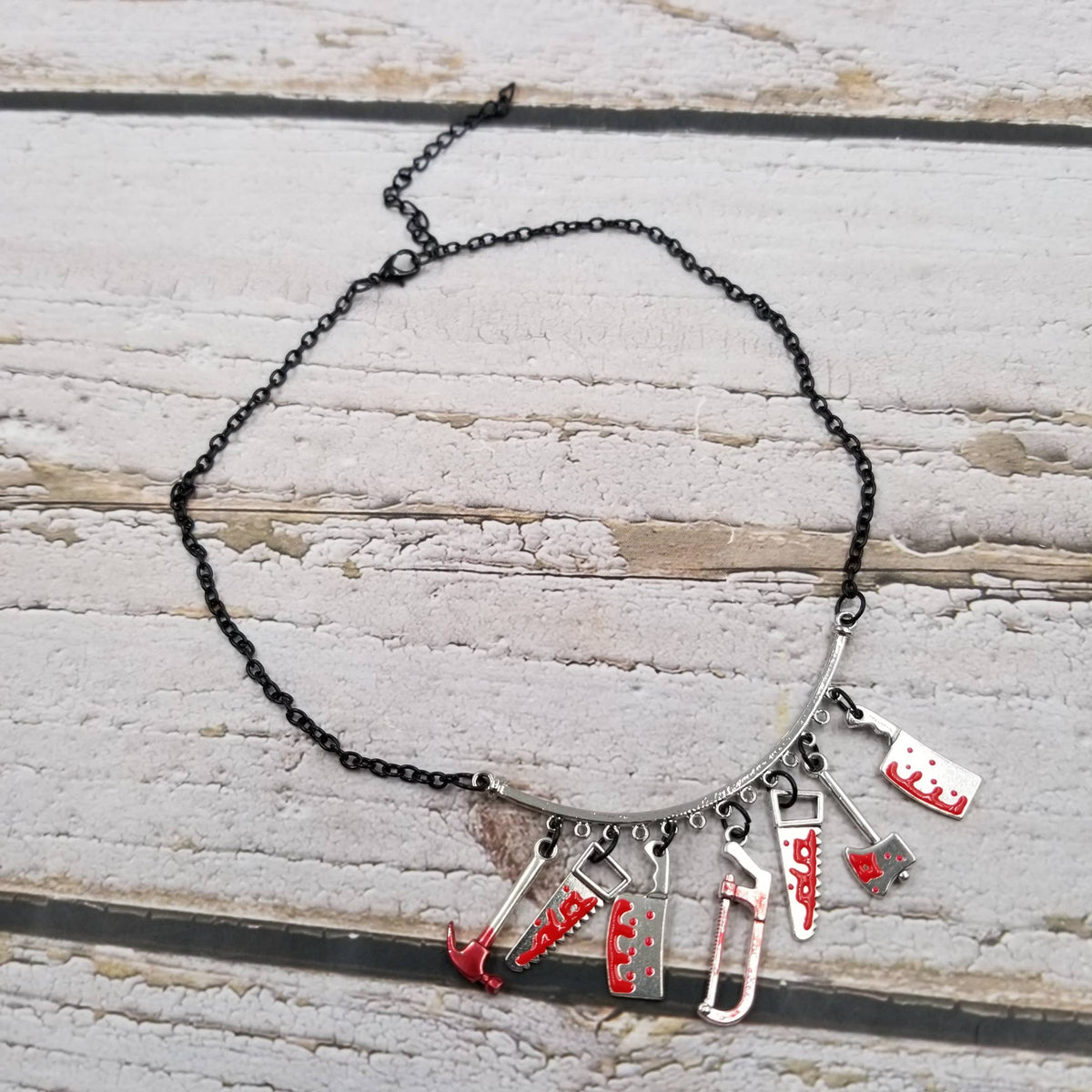 Bleeding Halloween Saw Axe Dagger Necklace